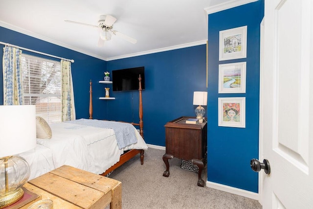 carpeted bedroom with ceiling fan, ornamental molding, and baseboards