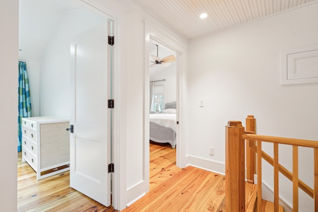 hall with light hardwood / wood-style floors