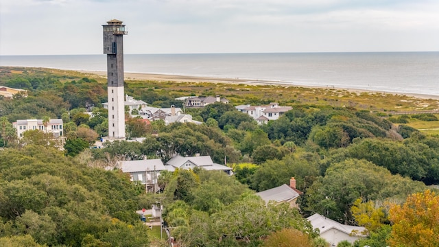 aerial view featuring a view of the beach and a water view