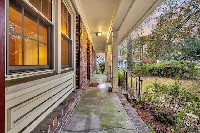 patio terrace at dusk with a porch