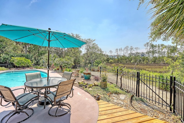 1308 Divot Ct, Mount Pleasant, SC 29466 - view of patio / terrace featuring view of wooded area and outdoor dining space