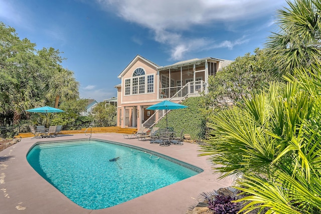 1308 Divot Ct, Mount Pleasant, SC 29466 - outdoor pool with a patio, a sunroom, and outdoor dining area