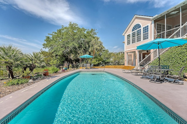 1308 Divot Ct, Mount Pleasant, SC 29466 - view of swimming pool featuring a patio and a sunroom