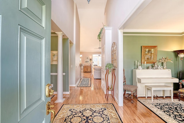 1308 Divot Ct, Mount Pleasant, SC 29466 - foyer entrance featuring decorative columns, wood finished floors, baseboards, and crown molding