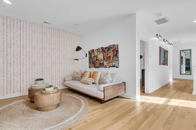 sitting room with light wood-type flooring