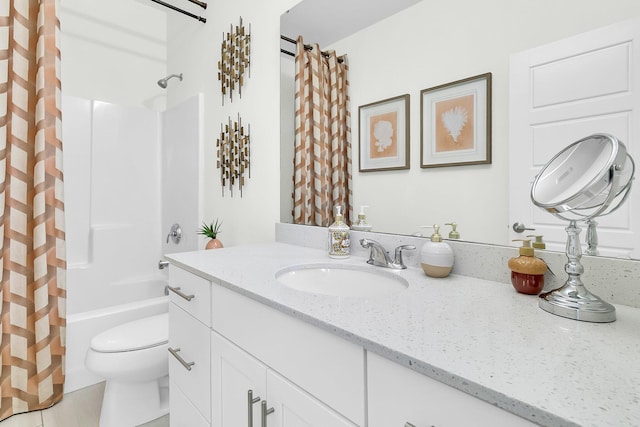 full bathroom with tile patterned flooring, vanity, toilet, and shower / bath combination with curtain