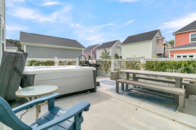 view of patio / terrace featuring a hot tub