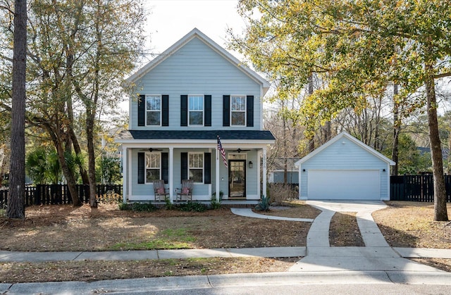 view of property featuring a porch and a garage