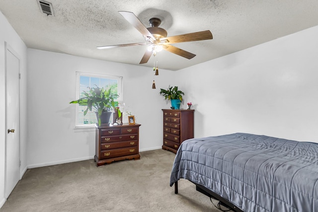 21 Rivers Point Row Apt 11C, Charleston, SC 29412 - bedroom featuring light carpet, ceiling fan, baseboards, and a textured ceiling