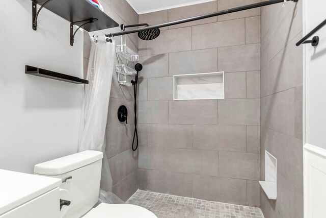 21 Rivers Point Row Apt 11C, Charleston, SC 29412 - full bathroom with a tile shower and toilet