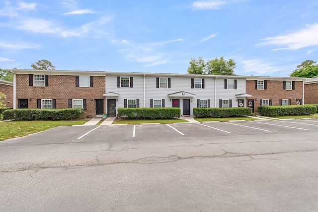 21 Rivers Point Row Apt 11C, Charleston, SC 29412 - view of building exterior featuring uncovered parking