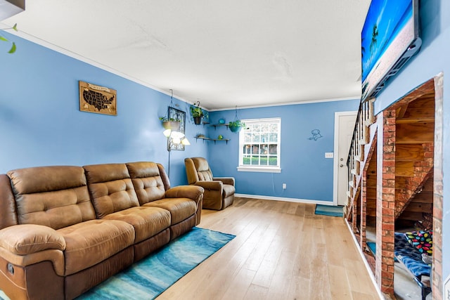 21 Rivers Point Row Apt 11C, Charleston, SC 29412 - living area featuring ornamental molding, wood-type flooring, baseboards, and stairway