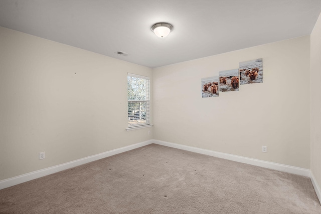 view of carpeted spare room