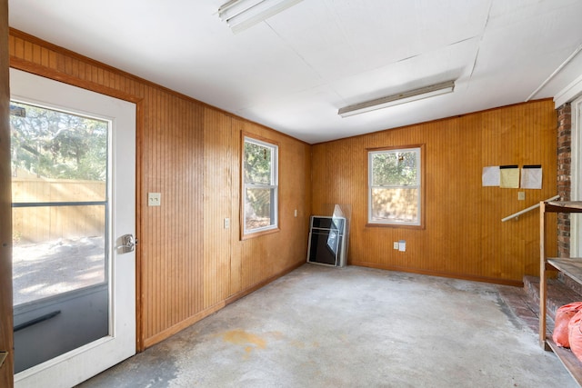 interior space featuring wooden walls