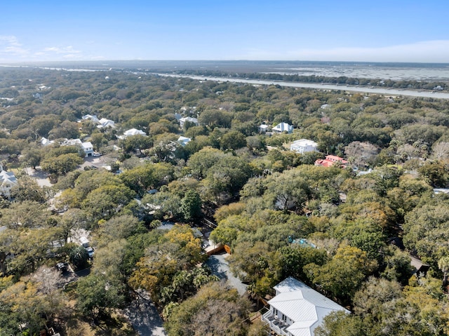 drone / aerial view featuring a wooded view