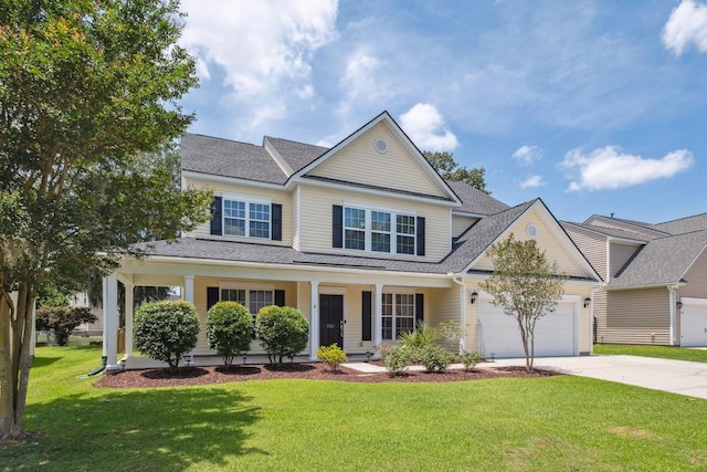 7511 Hawks Cir, Hanahan, SC 29410 - view of front of property featuring driveway, an attached garage, a front lawn, a shingled roof, and a porch