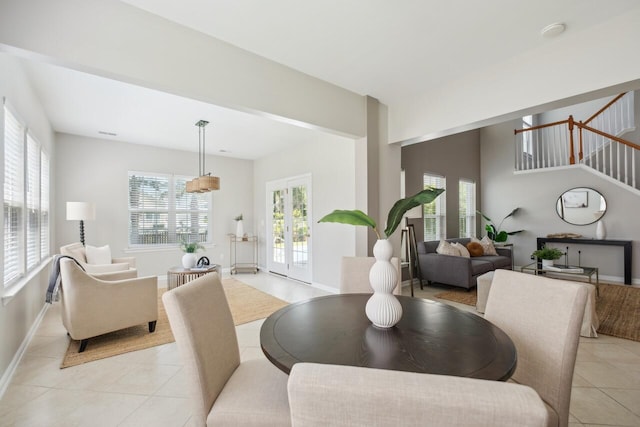 7511 Hawks Cir, Hanahan, SC 29410 - dining room with light tile patterned floors and stairs