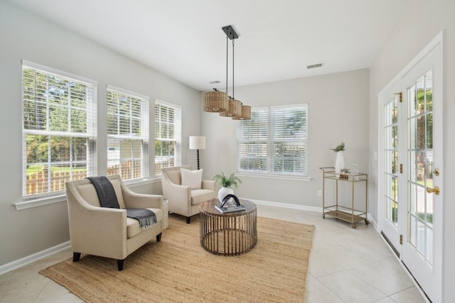 7511 Hawks Cir, Hanahan, SC 29410 - living area featuring light tile patterned floors