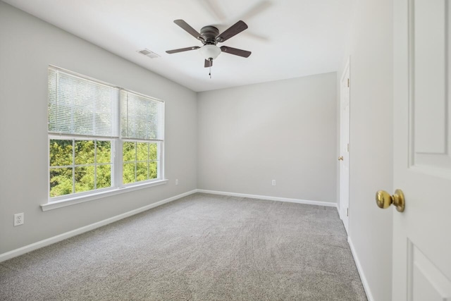 7511 Hawks Cir, Hanahan, SC 29410 - empty room with carpet flooring and a ceiling fan