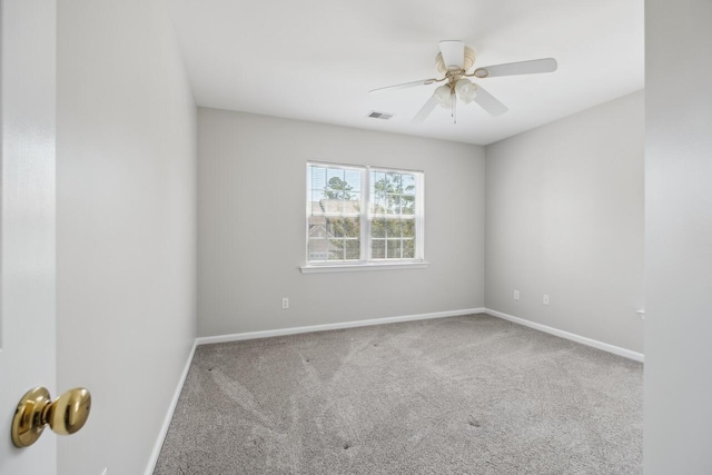 7511 Hawks Cir, Hanahan, SC 29410 - carpeted spare room with baseboards and ceiling fan