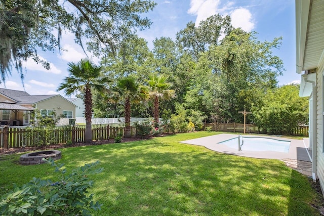7511 Hawks Cir, Hanahan, SC 29410 - fenced backyard with a fire pit
