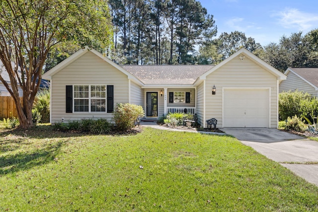 single story home featuring a garage and a front lawn