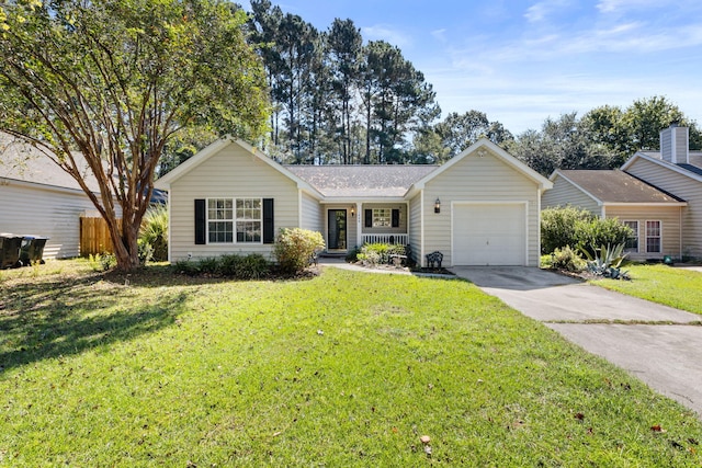 ranch-style house with a garage and a front lawn