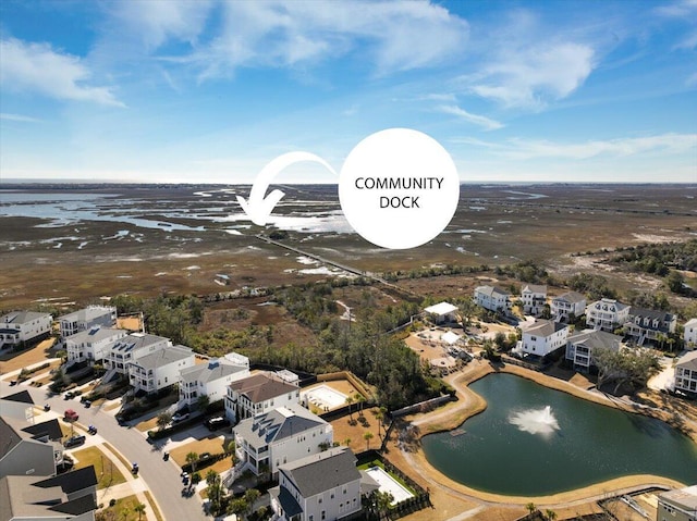 bird's eye view with a water view and a residential view