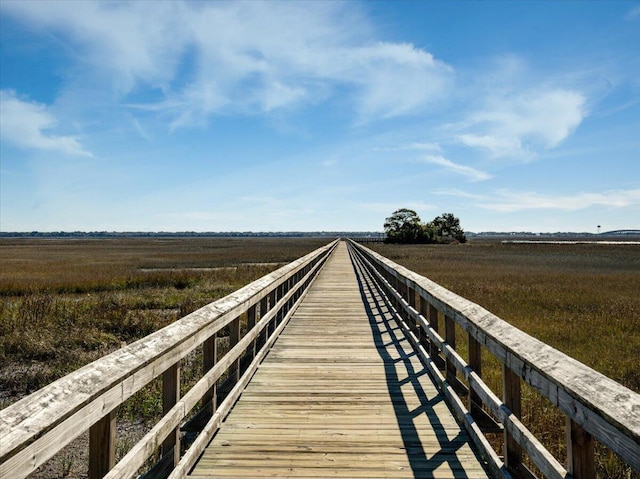 view of dock featuring a rural view