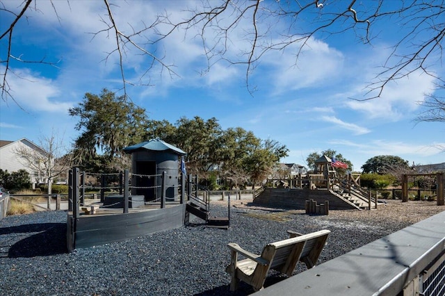 community play area featuring fence