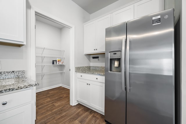 1032 Peridote Way, Ladson, SC 29456 - kitchen featuring stainless steel fridge with ice dispenser, dark wood-type flooring, white cabinetry, and light stone countertops