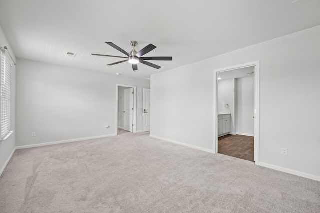 1032 Peridote Way, Ladson, SC 29456 - unfurnished bedroom featuring carpet flooring, ensuite bathroom, and ceiling fan