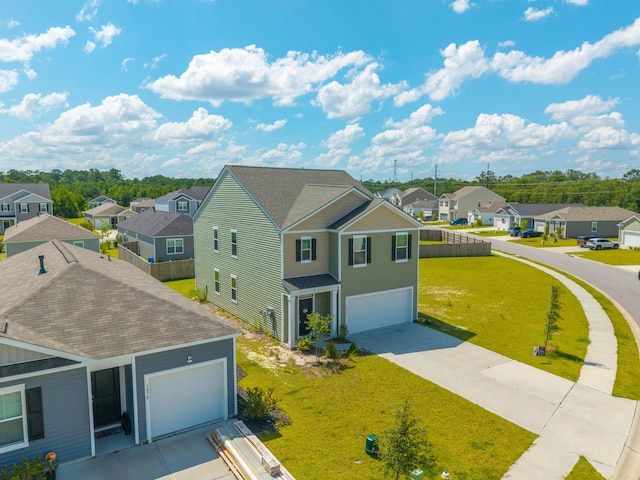 1032 Peridote Way, Ladson, SC 29456 - view of side of home with a residential view, concrete driveway, and a garage