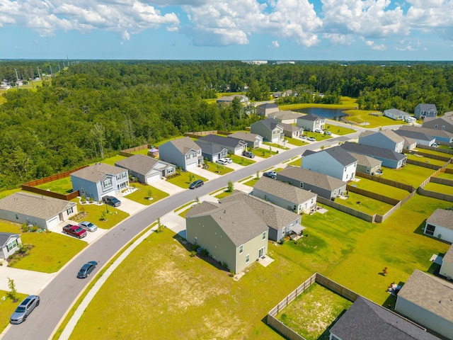 1032 Peridote Way, Ladson, SC 29456 - aerial view of residential area featuring a forest and a large body of water