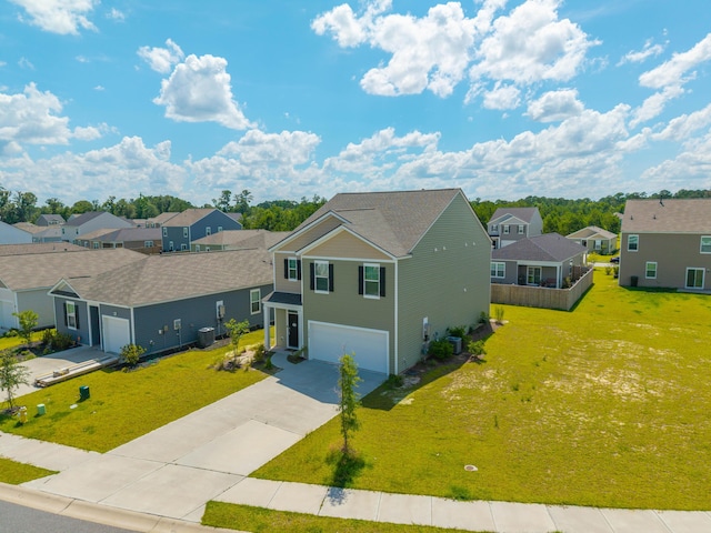 1032 Peridote Way, Ladson, SC 29456 - view of front of home featuring a residential view, a garage, concrete driveway, and a front lawn