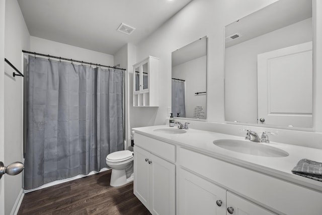 1032 Peridote Way, Ladson, SC 29456 - bathroom featuring double vanity, wood finished floors, and curtained shower