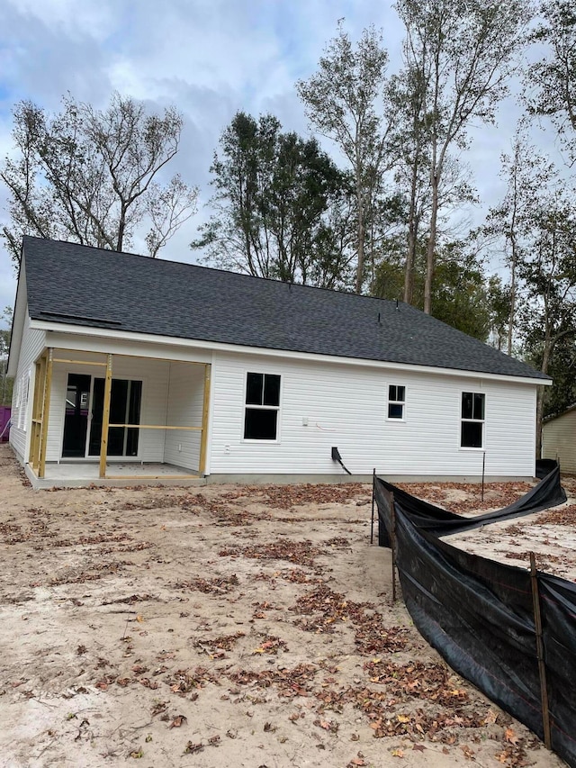 rear view of property with a patio area