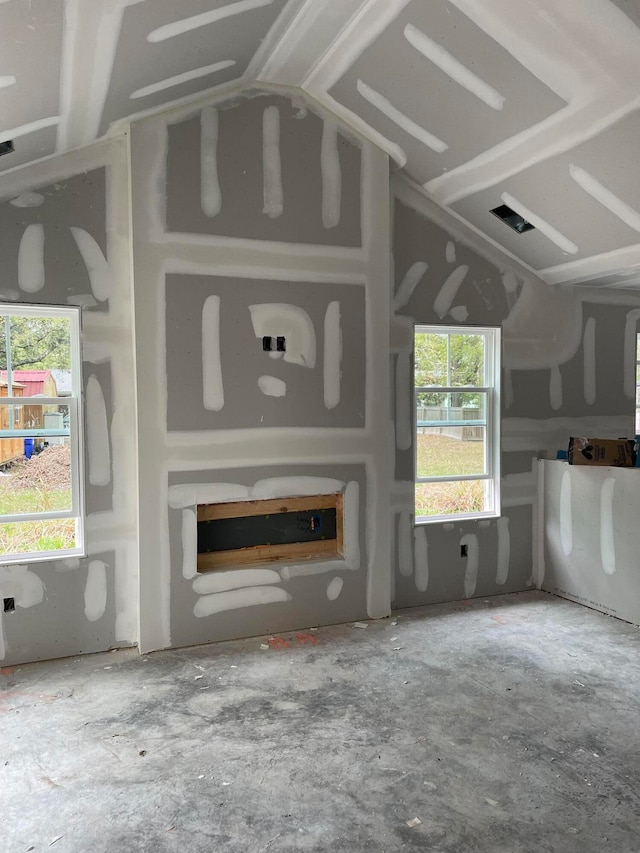 unfurnished living room with a healthy amount of sunlight