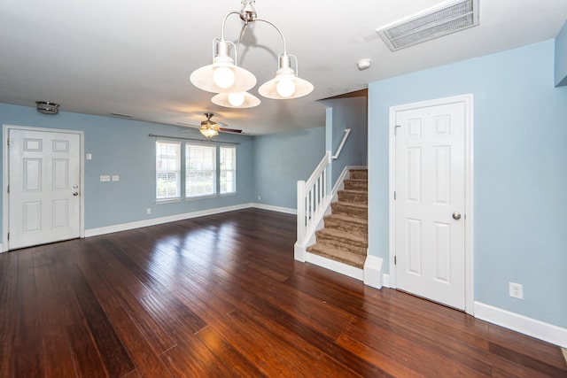 interior space featuring dark hardwood / wood-style flooring and ceiling fan