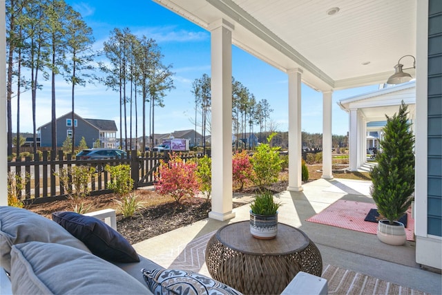 view of patio featuring fence