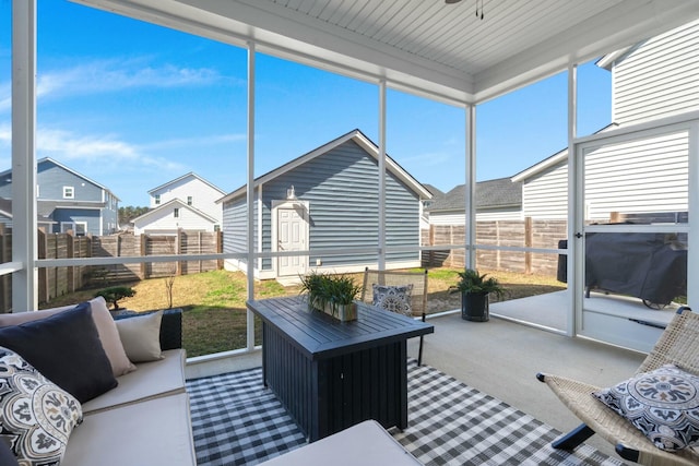 sunroom with a residential view