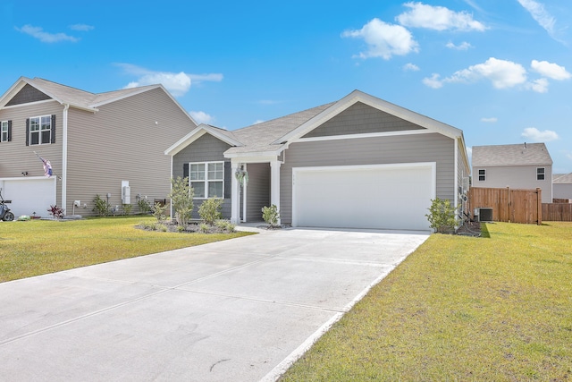 ranch-style house featuring central air condition unit and a front yard