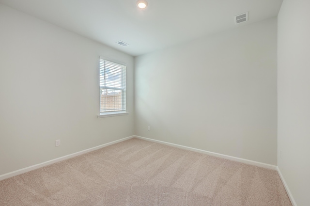 empty room with carpet floors