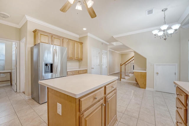 1308 Wild Olive Dr, Mount Pleasant, SC 29464 - kitchen featuring stainless steel fridge with ice dispenser, ornamental molding, light tile patterned flooring, light countertops, and a kitchen island