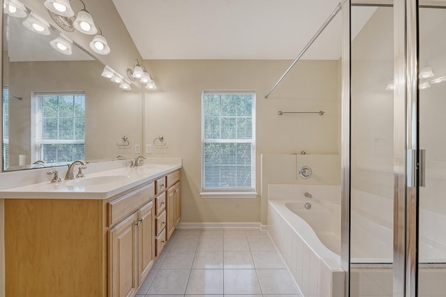 1308 Wild Olive Dr, Mount Pleasant, SC 29464 - bathroom featuring double vanity, a garden tub, and tile patterned flooring