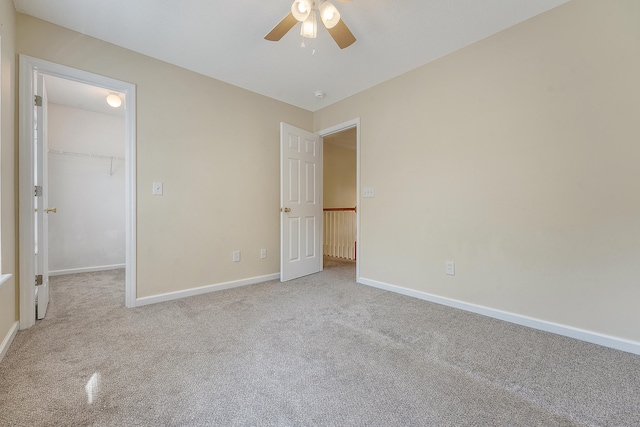 1308 Wild Olive Dr, Mount Pleasant, SC 29464 - unfurnished bedroom featuring carpet floors, a spacious closet, ceiling fan, and a closet