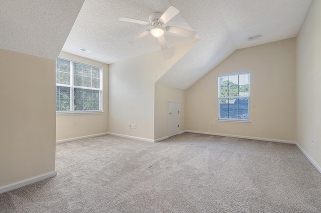 1308 Wild Olive Dr, Mount Pleasant, SC 29464 - additional living space with carpet, a textured ceiling, ceiling fan, and vaulted ceiling