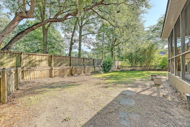 1308 Wild Olive Dr, Mount Pleasant, SC 29464 - fenced backyard featuring a sunroom