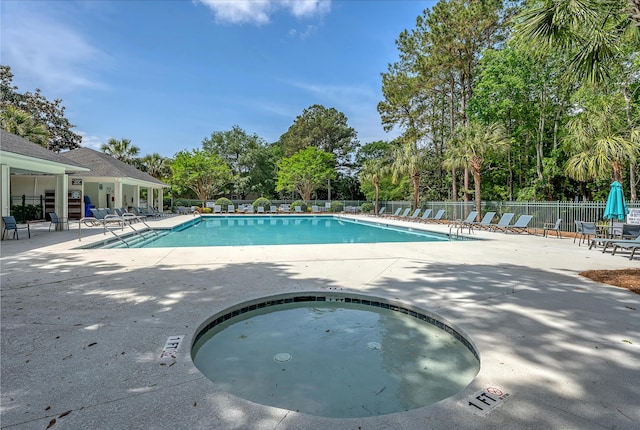 1308 Wild Olive Dr, Mount Pleasant, SC 29464 - community pool featuring a patio and view of wooded area