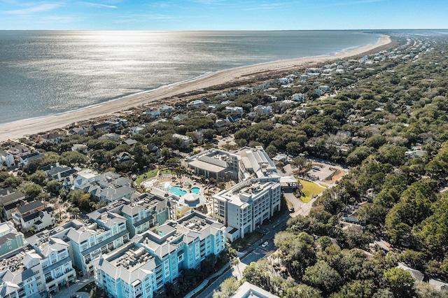 aerial view with a water view and a beach view